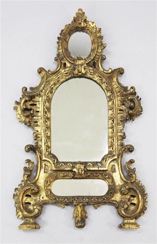A 19th century Continental carved giltwood wall mirror, W.1ft 10in.